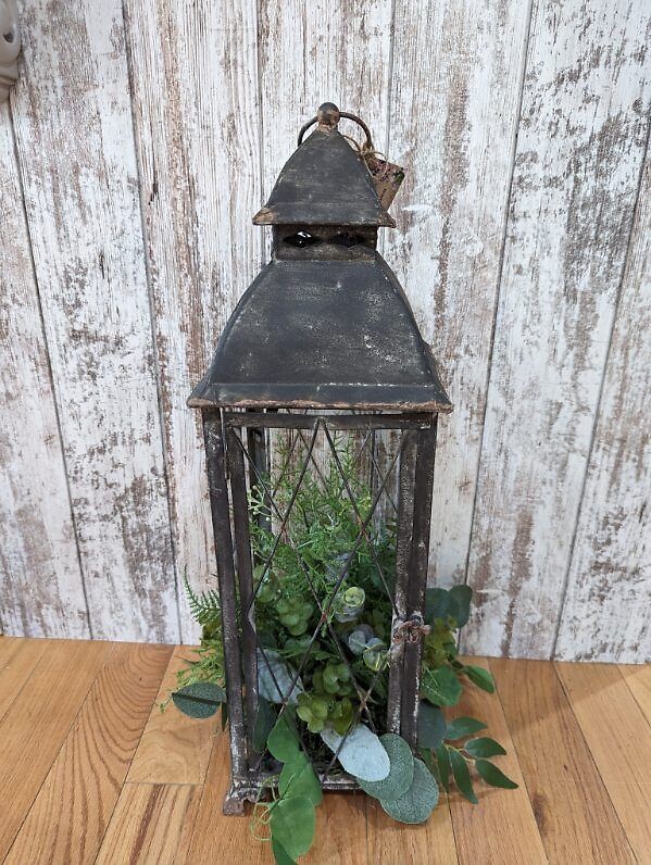 Distressed Lantern With Greenery