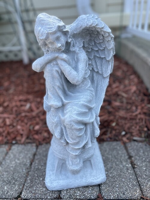 sitting angel